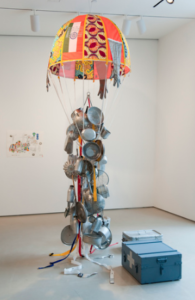 LUCY + JORGE ORTA, ANTARCTICA DROP PARACHUTE, 2008, Steel frame, various textiles, flags, silkscreen print, webbing, Red Cross crate, various objects, water recipients and kitchen utensils, 120 CM de haut, ©LUCY + JORGE ORTA